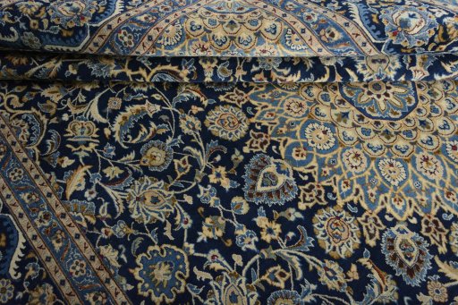Close-up detail of 2000s Kashmar rug from Iran / Persia showing Wool weave