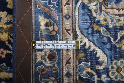 Backside of handmade 2000s Kashmar rug showing knot structure and weave density