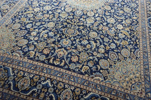 Close-up detail of 2000s Kashmar rug from Iran / Persia showing Wool weave