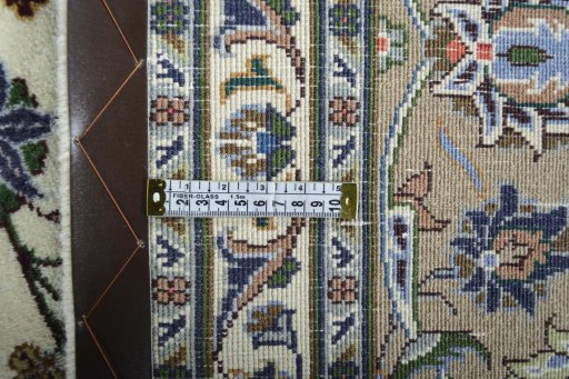 Backside of handmade New Kashmar rug showing knot structure and weave density