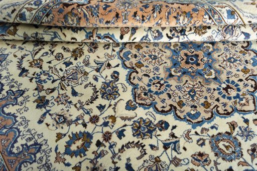 Close-up detail of 2000s Kashmar rug from Iran / Persia showing Wool weave