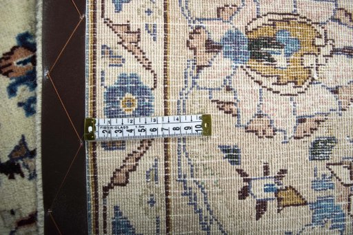 Backside of handmade 2000s Kashmar rug showing knot structure and weave density