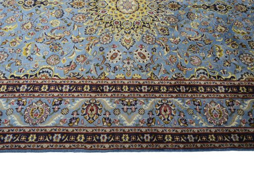 Corner detail of 2000s Kashmar rug showing border pattern and Wool pile