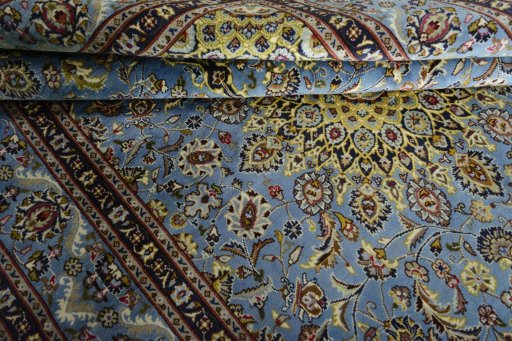 Close-up detail of 2000s Kashmar rug from Iran / Persia showing Wool weave