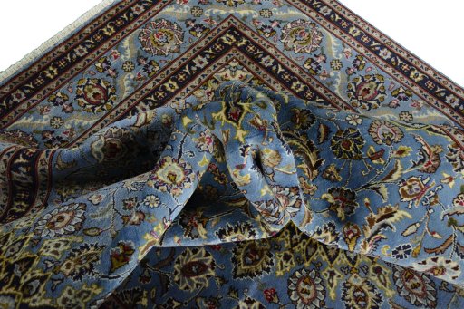 Surface texture of 2000s Kashmar rug with natural Wool and intricate pattern