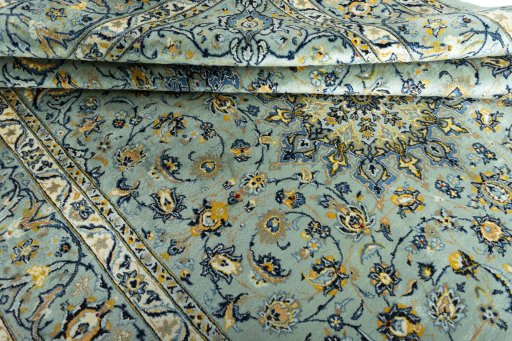 Close-up detail of 2000s Kashmar rug from Iran / Persia showing Wool weave