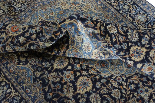 Surface texture of 2000s Kashmar rug with natural Wool and intricate pattern