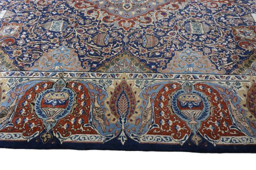 Corner detail of 2000s Kashmar rug showing border pattern and Wool pile