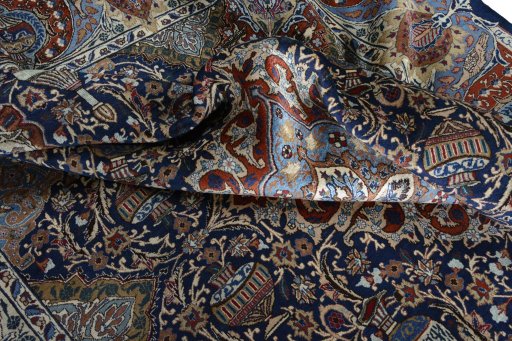 Surface texture of 2000s Kashmar rug with natural Wool and intricate pattern