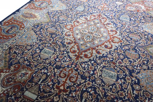 Backside of handmade 2000s Kashmar rug showing knot structure and weave density