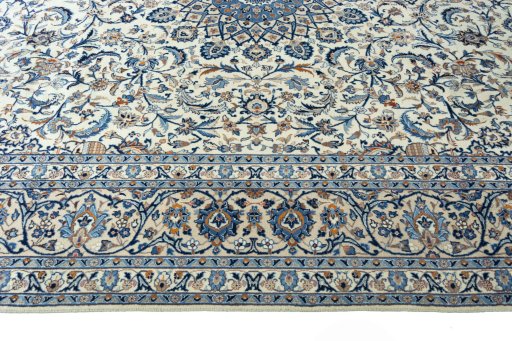 Corner detail of 2000s Kashmar rug showing border pattern and Wool pile