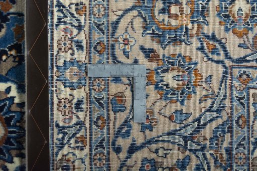 Backside of handmade 2000s Kashmar rug showing knot structure and weave density