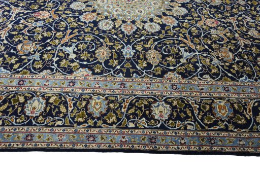 Corner detail of 2000s Kashmar rug showing border pattern and Wool pile