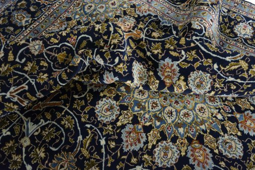 Surface texture of 2000s Kashmar rug with natural Wool and intricate pattern