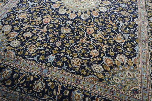 Close-up detail of 2000s Kashmar rug from Iran / Persia showing Wool weave