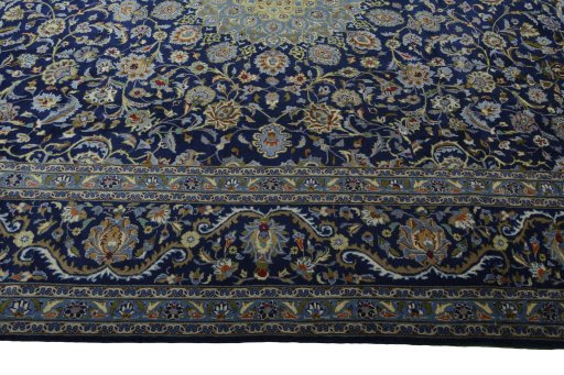 Corner detail of 2000s Kashmar rug showing border pattern and Wool pile