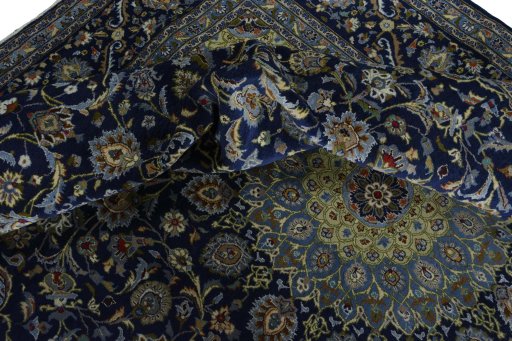 Surface texture of 2000s Kashmar rug with natural Wool and intricate pattern