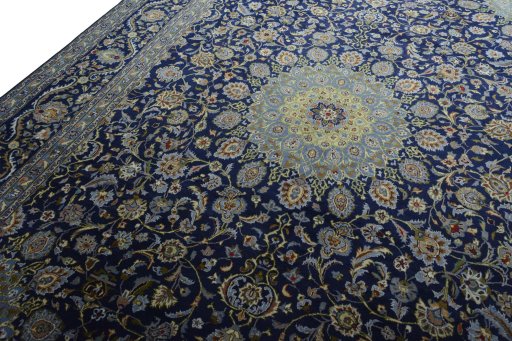 Backside of handmade 2000s Kashmar rug showing knot structure and weave density