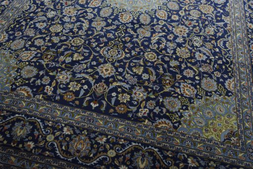 Close-up detail of 2000s Kashmar rug from Iran / Persia showing Wool weave