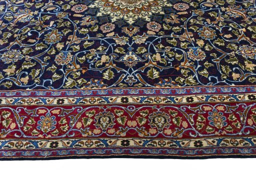 Corner detail of 2000s Kashmar rug showing border pattern and Wool pile