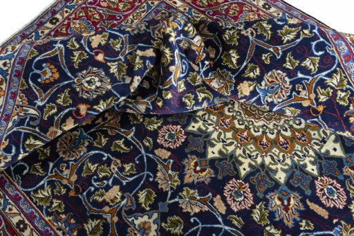 Surface texture of 2000s Kashmar rug with natural Wool and intricate pattern