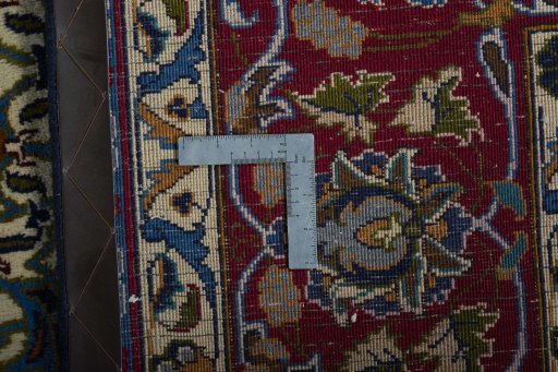 Backside of handmade 2000s Kashmar rug showing knot structure and weave density
