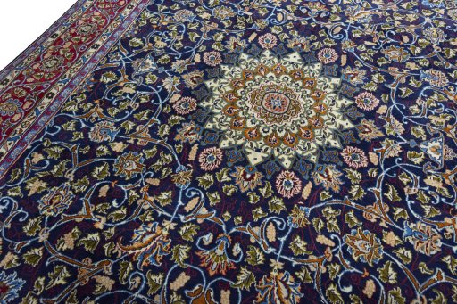 Backside of handmade 2000s Kashmar rug showing knot structure and weave density