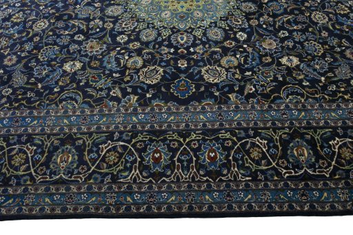 Corner detail of 2000s Kashmar rug showing border pattern and Wool pile