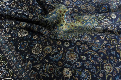 Surface texture of 2000s Kashmar rug with natural Wool and intricate pattern