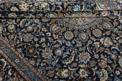 Close-up detail of 2000s Kashmar rug from Iran / Persia showing Wool weave