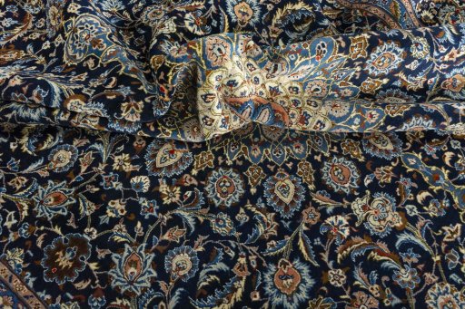 Surface texture of 2000s Kashmar rug with natural Wool and intricate pattern