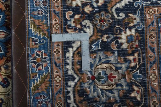 Backside of handmade 2000s Kashmar rug showing knot structure and weave density