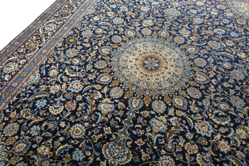 Backside of handmade 2000s Kashmar rug showing knot structure and weave density