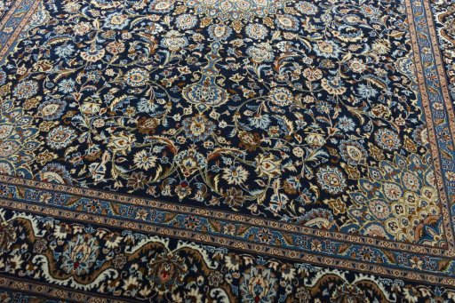 Close-up detail of 2000s Kashmar rug from Iran / Persia showing Wool weave