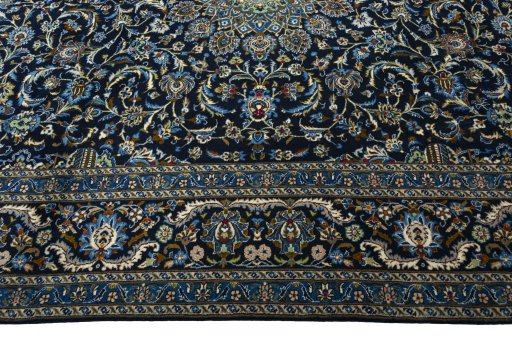 Corner detail of 2000s Kashmar rug showing border pattern and Wool pile