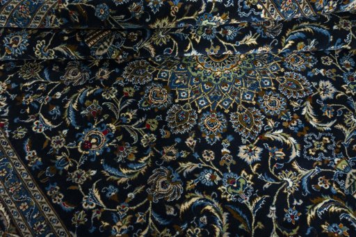 Close-up detail of 2000s Kashmar rug from Iran / Persia showing Wool weave