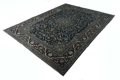 Corner detail of 2000s Kashmar rug showing border pattern and Wool pile
