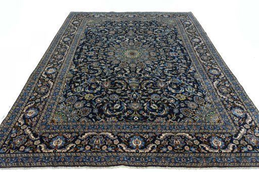 Surface texture of 2000s Kashmar rug with natural Wool and intricate pattern