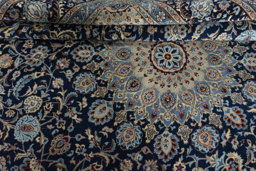 Close-up detail of 2000s Kashmar rug from Iran / Persia showing Wool weave