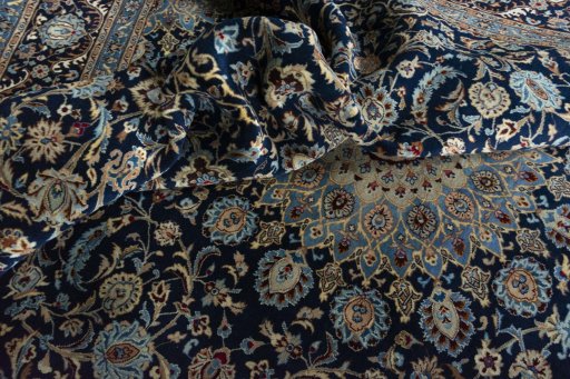 Surface texture of 2000s Kashmar rug with natural Wool and intricate pattern