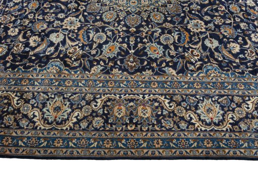 Corner detail of 2000s Kashmar rug showing border pattern and Wool pile