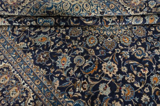 Close-up detail of 2000s Kashmar rug from Iran / Persia showing Wool weave