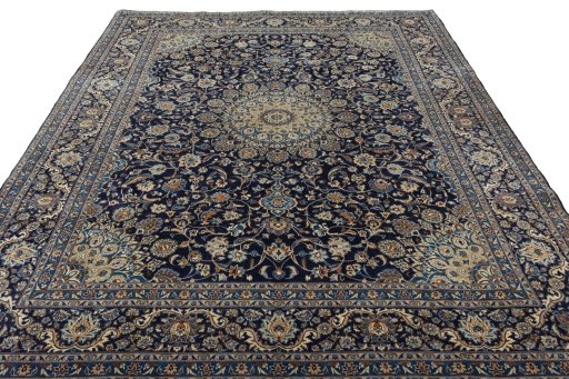 Surface texture of 2000s Kashmar rug with natural Wool and intricate pattern