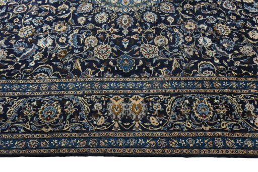 Corner detail of 2000s Kashmar rug showing border pattern and Wool pile