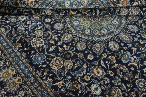 Close-up detail of 2000s Kashmar rug from Iran / Persia showing Wool weave