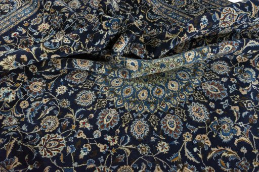 Surface texture of 2000s Kashmar rug with natural Wool and intricate pattern