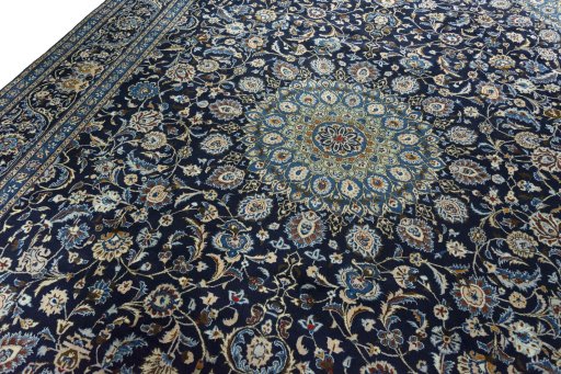 Backside of handmade 2000s Kashmar rug showing knot structure and weave density
