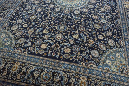 Close-up detail of 2000s Kashmar rug from Iran / Persia showing Wool weave