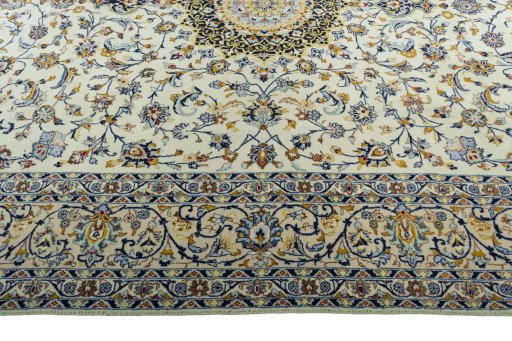 Corner detail of 2000s Kashmar rug showing border pattern and Wool pile