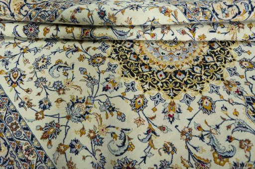 Close-up detail of 2000s Kashmar rug from Iran / Persia showing Wool weave